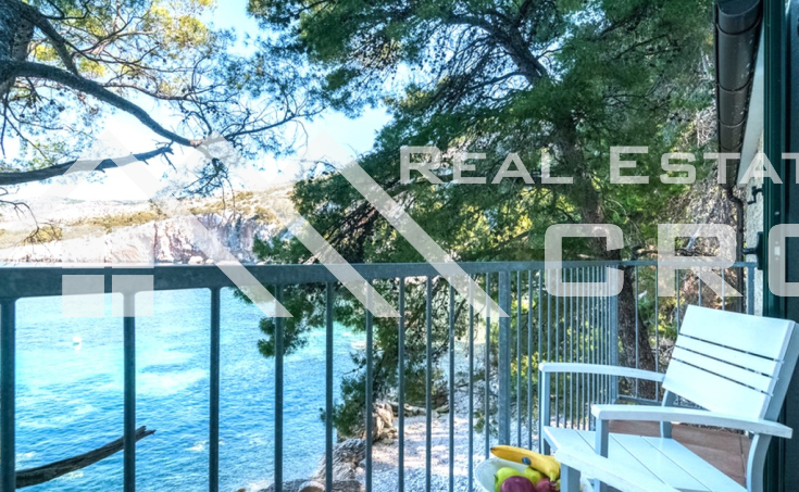 Hvar properties - Stone house boasting a scenic location, in a small bay with crystal clear sea, for sale