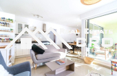 Beautifully furnished three-bedroom apartment with a comfortable loggia and a small garden, for sale