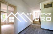 Spacious stone house for renovation, on a large plot with a view, for sale
