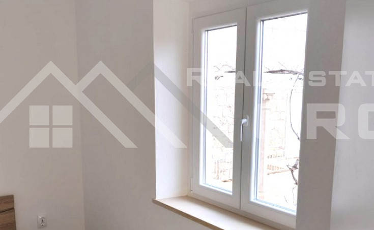 One-bedroom apartment just above the sea and a pebble beach, for sale