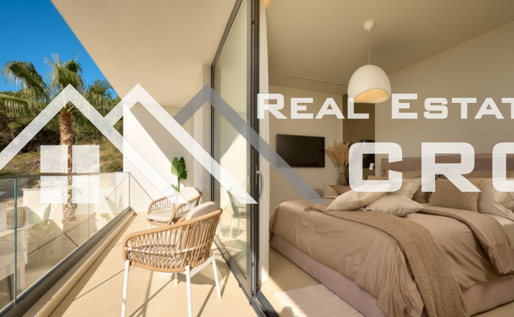 Luxurious villa with a pool and garage, situated in a peaceful setting with an open sea view, for sale (10)