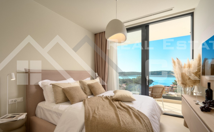 Luxurious villa with a pool and garage, situated in a peaceful setting with an open sea view, for sale (13)