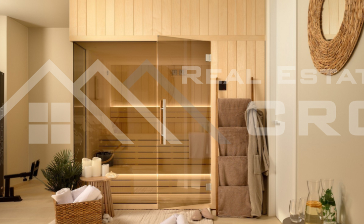 Luxurious villa with a pool and garage, situated in a peaceful setting with an open sea view, for sale (14)