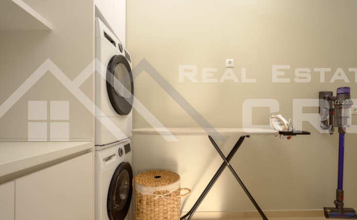 Luxurious villa with a pool and garage, situated in a peaceful setting with an open sea view, for sale (16)