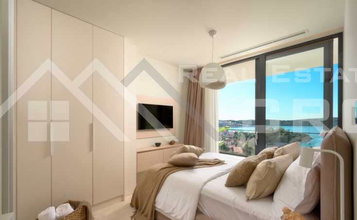 Luxurious villa with a pool and garage, situated in a peaceful setting with an open sea view, for sale (19)