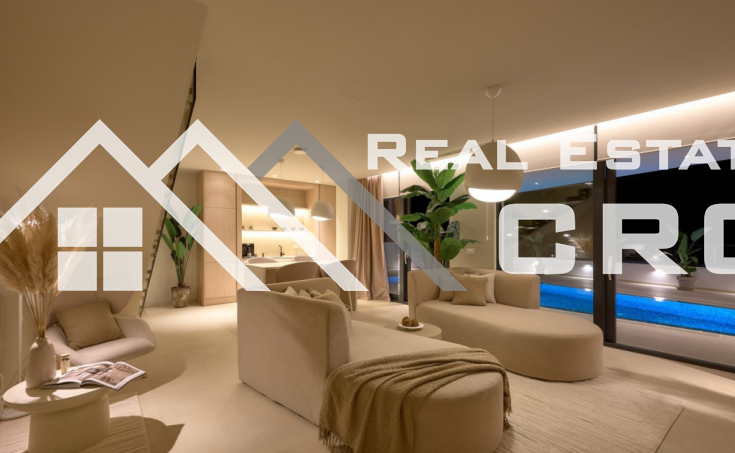 Luxurious villa with a pool and garage, situated in a peaceful setting with an open sea view, for sale (2)