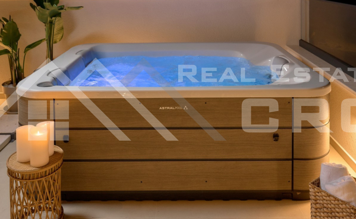 Luxurious villa with a pool and garage, situated in a peaceful setting with an open sea view, for sale (20)