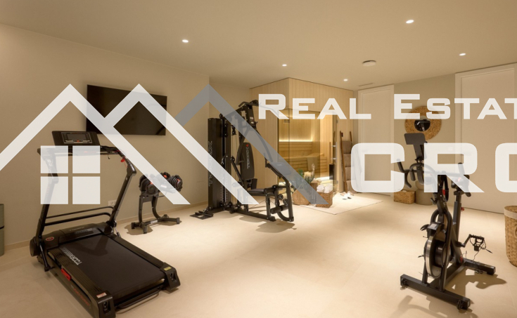 Luxurious villa with a pool and garage, situated in a peaceful setting with an open sea view, for sale (5)