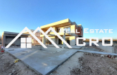 Modern villa with a swimming pool, situated in a peaceful settlement, for sale