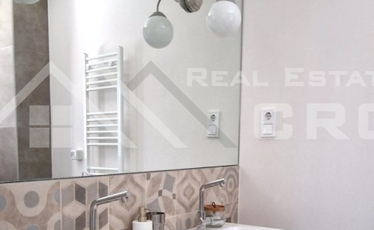 Spacious duplex apartment with loggias and a garden, in a pleasant area near a beach, for sale (5)