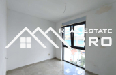 Luxurious penthouse apartment with a large roof terrace, near a beach, for sale