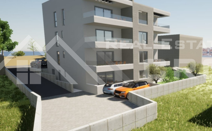 Fully furnished apartment with a terrace and garden, in a new building near 