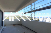 Two-bedroom apartment with a sea view, in a new development with a gara
