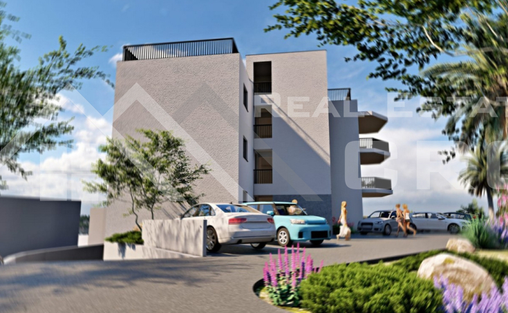 Two-bedroom apartment with a covered terrace, in a new building with a garage, for sale