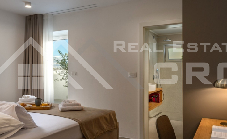 Beautiful stone villa with a pool offering a lovely sea view, for sale (11)