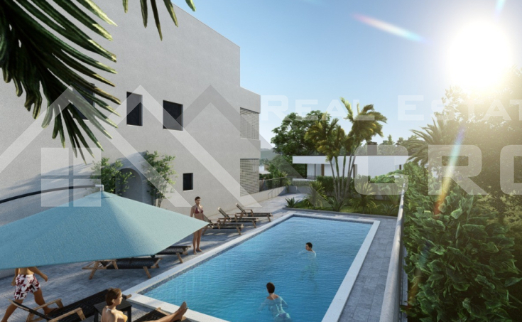 Modern apartments in a new development with a pool and garage, placed near the sea