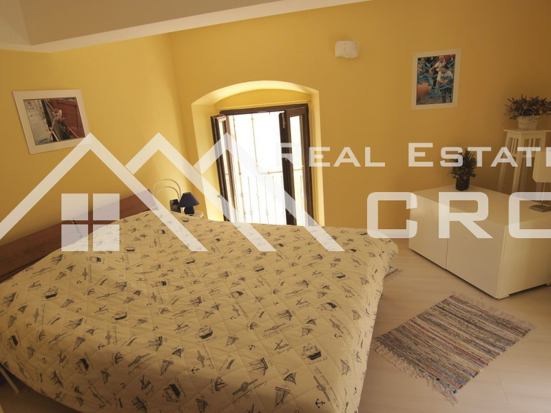 Vis properties Renovated stone house for sale in the centre of Komiza