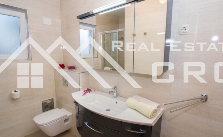 Excellent fully furnished apartment house placed above a pebble beach, for sale (13)